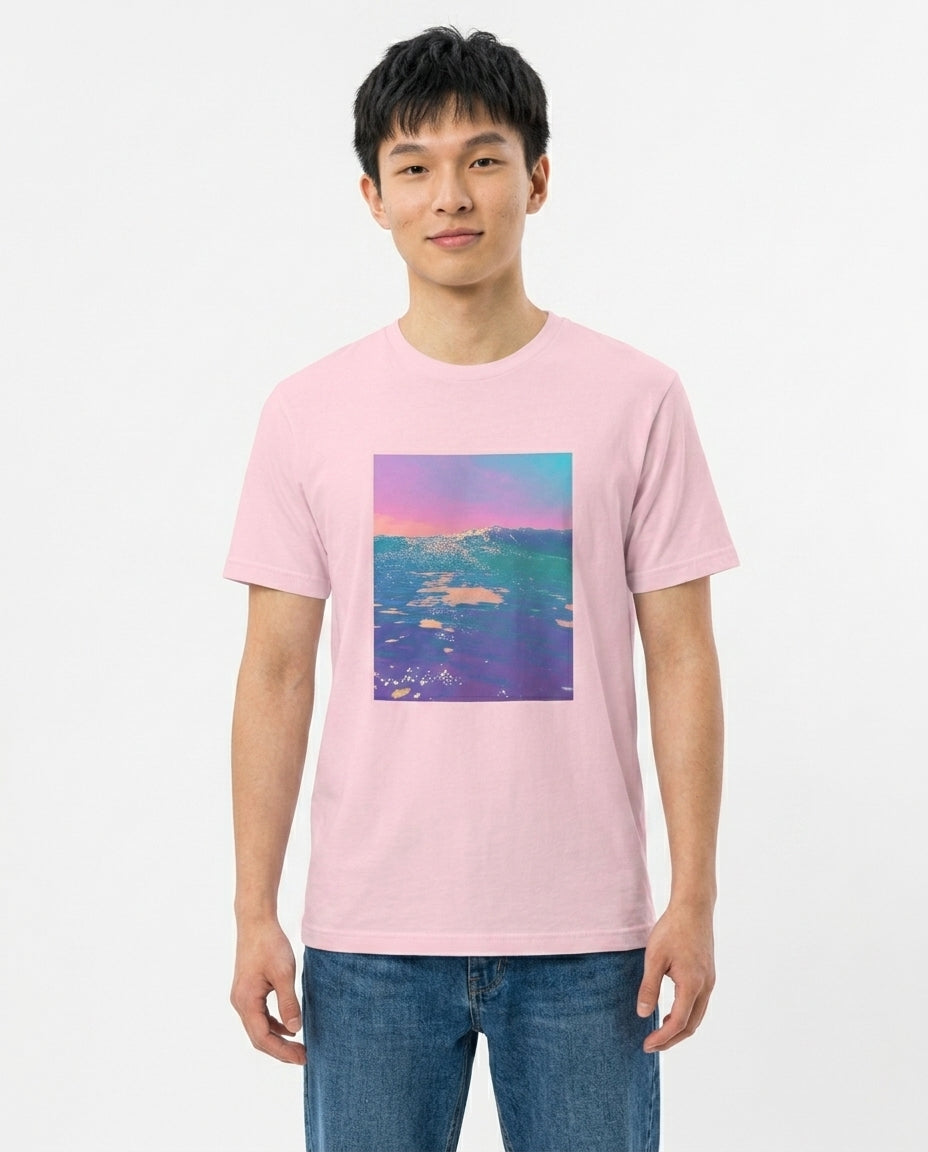 Person wearing a pink t-shirt with a colorful graphic on a white background