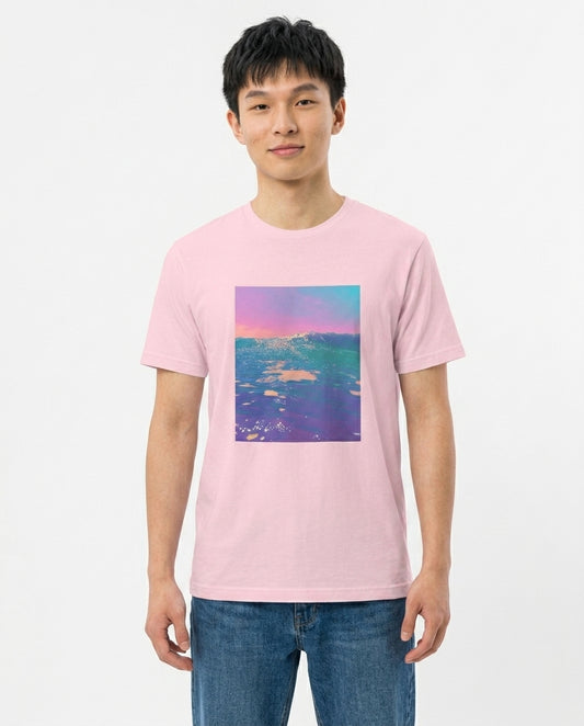 Person wearing a pink t-shirt with a colorful graphic on a white background