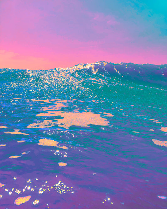 Colorful ocean wave with a gradient sky
