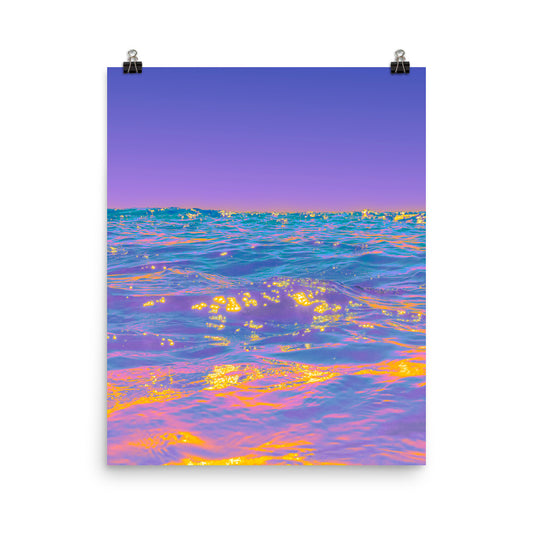 Unframed fine art ocean photography poster print of purple and teal sea surface with golden light reflections, against a clear violet sky, ideal for living room or bedroom wall art.​​​​​​​​​​​​​​​​