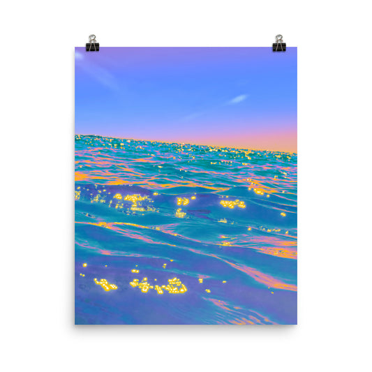 Unframed fine art ocean photography print, low-angle wave surface with golden light clusters on teal and violet water, pastel sunset sky, coastal wall art