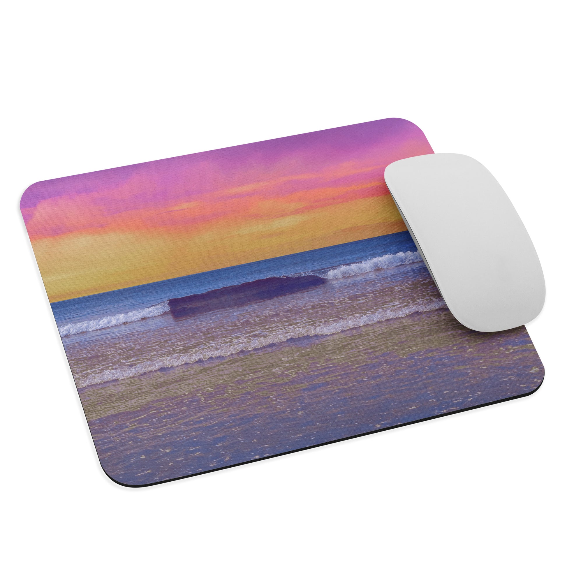 Mouse pad with beach sunset design and a mouse on a white background